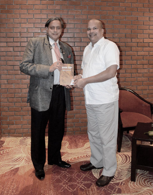 Moragoda presents a copy of Ashoka Vadana to ICP MP Tharoor